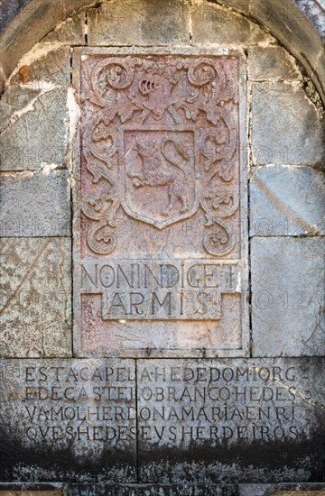 Coat of arms and inscriptions