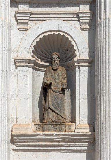 Apostle statue in a niche of the facade of St. Cajetan Church