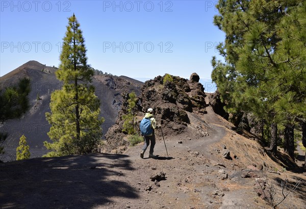 Female hiker in front of volcano Duraznero