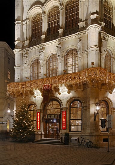 Christmas lighting on facade at night