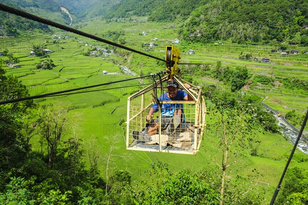 Cargo seat above Hapao rice terraces