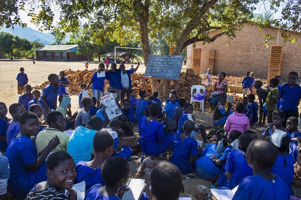 Primary school outside with many children