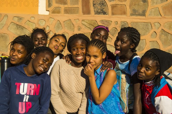 Children posing happily for the camera