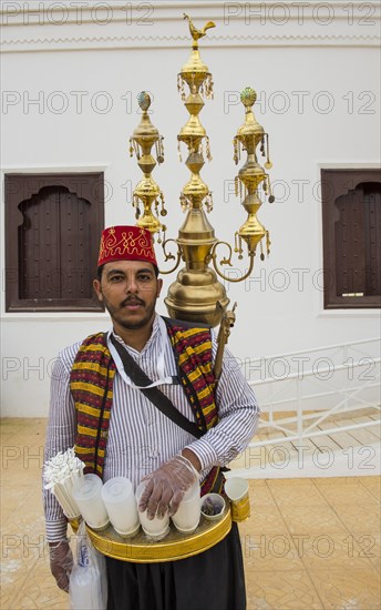 Traditional dressed tea seller