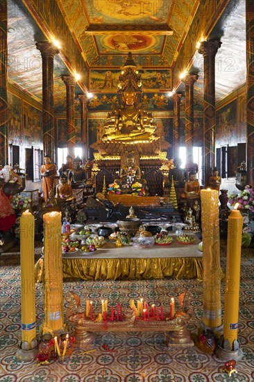 Gilt Bronze Buddha with offerings