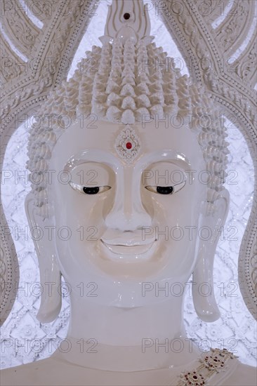 Buddha statue in the white prayer hall