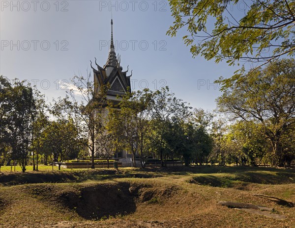 Mass graves in front of the Memorial Stupa