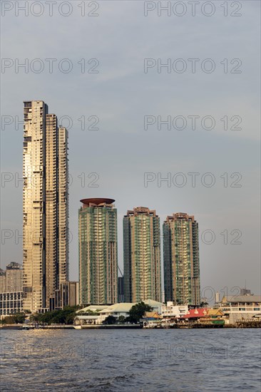 Four Seasons Private Residences and the three towers of the Chatrium Riverside Hotel Bangkok on the Chao Phraya River