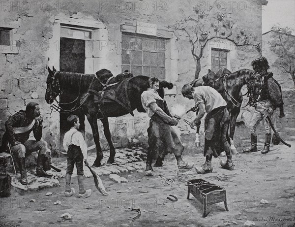 Farrier in fogging the horses