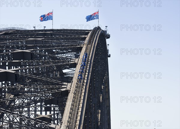 People walking on Sydney Harbor Bridge