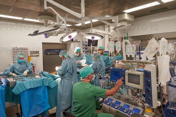 Heart surgeon Prof. Richard Frey during heart surgery in the operating room