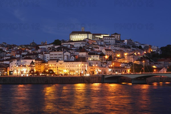 Historic centre with University and Mondego River at dusk