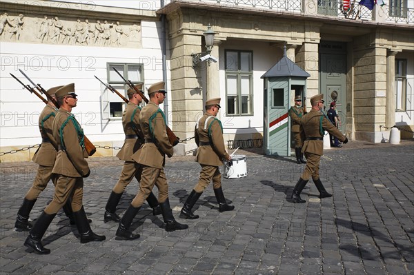 Guard soldiers changing guards in front of the Presidential Palace Palais Sandor