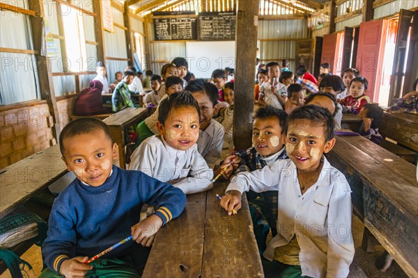 School children sitting at their desks