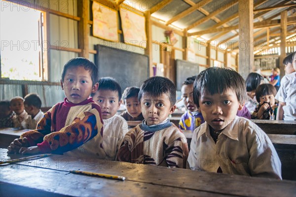 School children sitting at their desks