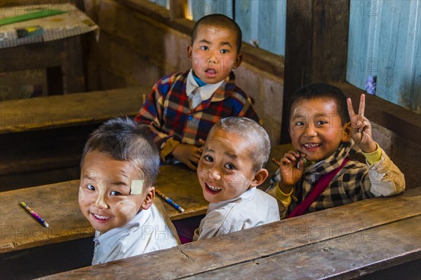 School children sitting at their desks