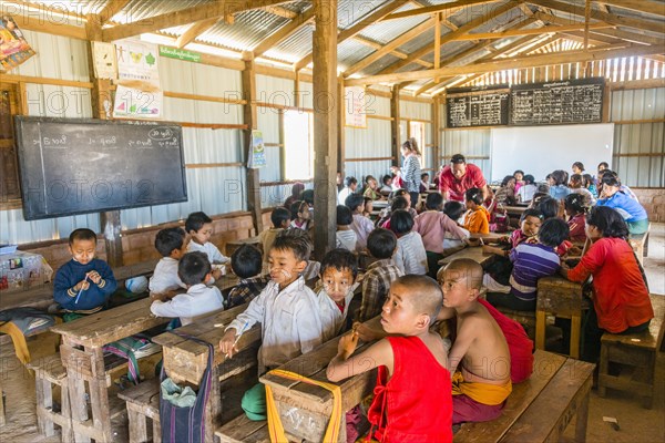 School children sitting at their desks