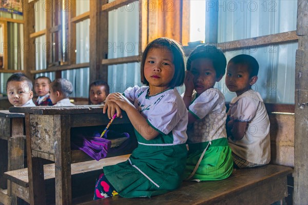 School children sitting at their desks