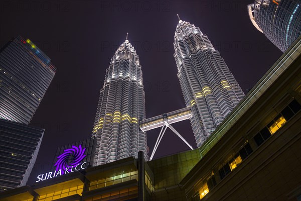 Lit Petronas Towers at night