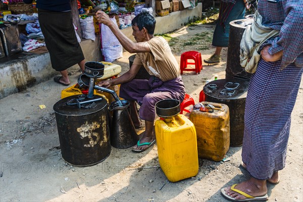 Man selling gasoline