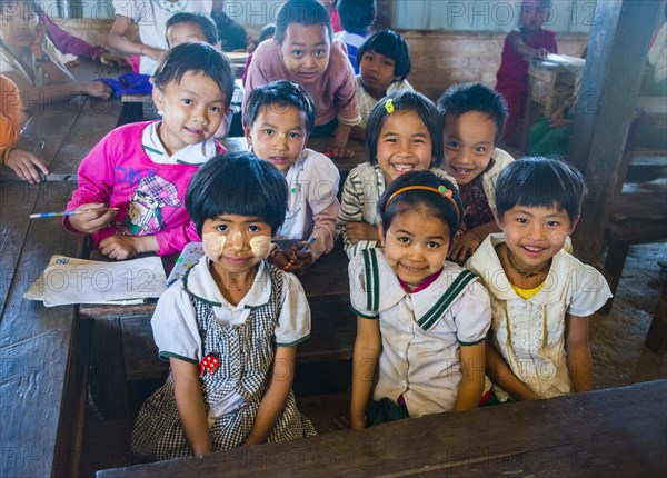 School children sitting at their desks