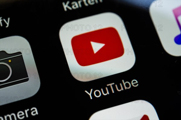 Smartphone screen displaying YouTube app in detail