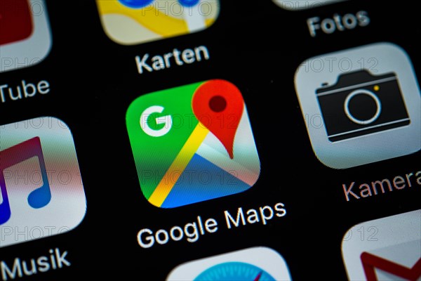 Smartphone screen displaying Google Maps and Camera apps in detail