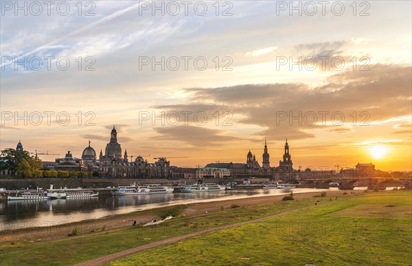 Sunset from the Carolabrucke with view of the Elbe meadows Konigsufer