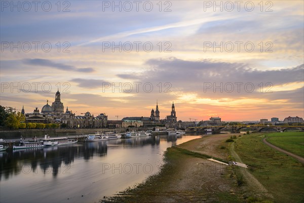 Sunset from the Carolabrucke with view of the Elbe meadows Konigsufer