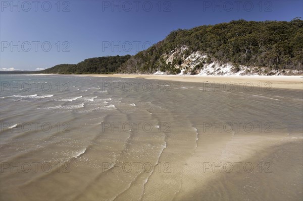 Bay with beach and cliffs