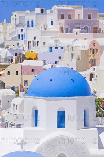 Orthodox church and colorful houses