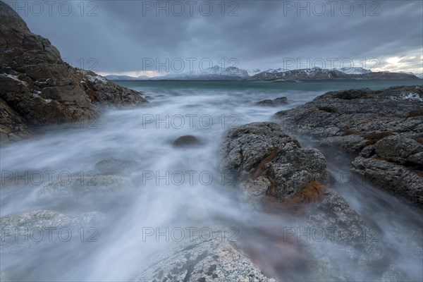 Dark clouds over the stormy sea