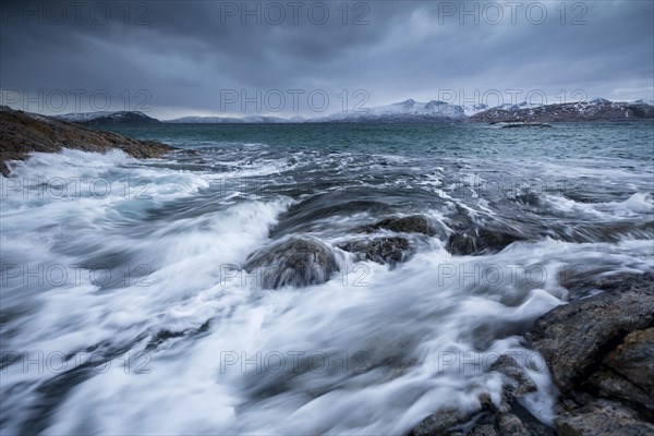 Dark clouds over the stormy sea
