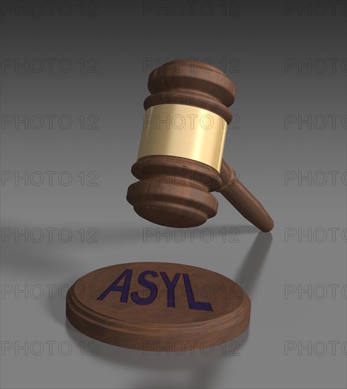 Gavel in front of grey background