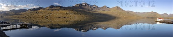 Mountain landscape reflected in Faskruosfjorour