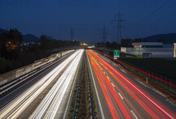 Road with light tracks at night