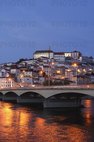 Historic centre with University and Mondego River at dusk