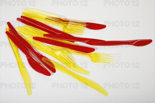 Red and yellow plastic cutlery