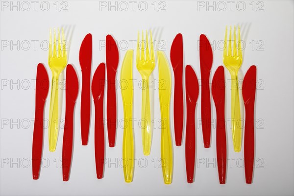 Red and yellow plastic cutlery