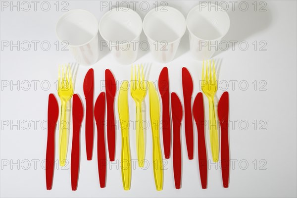 Red and yellow plastic cutlery
