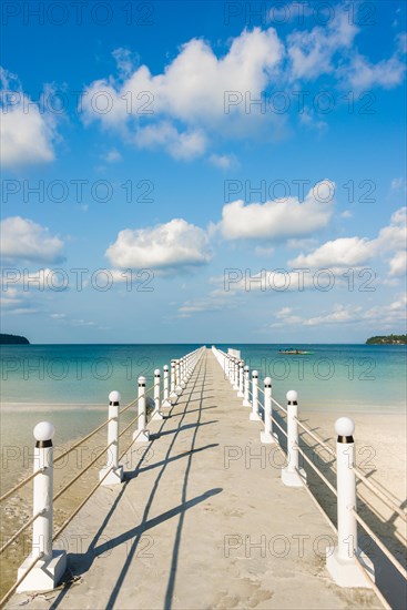 Pier on beach with turquoise water at Saracen Bay on Koh Rong Sanloem island