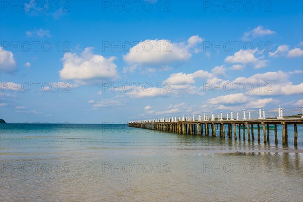 Pier on beach with turquoise water at Saracen Bay on Koh Rong Sanloem island