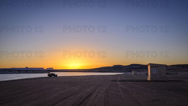 Beach cabin at sunrise
