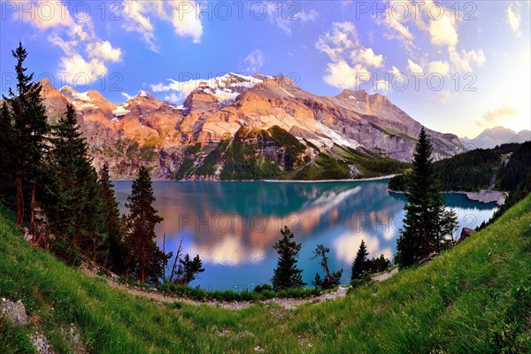 Mountains in the evening light at the Oeschinensee lake