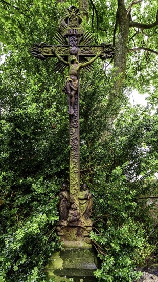 Old grave cross in the cemetery next to the ghost church of Lukova