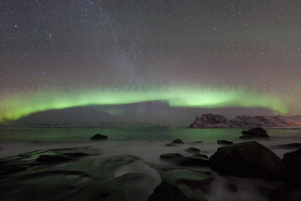 Beach of Utakleiv with Aurora Borealis