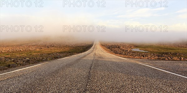 Road through a barren plateau