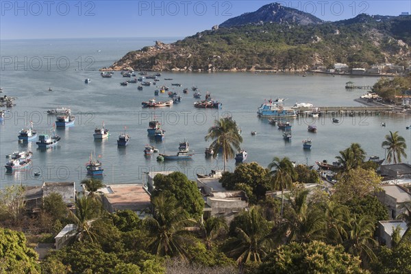 Colourful fishing boats in Vinh Hy bay