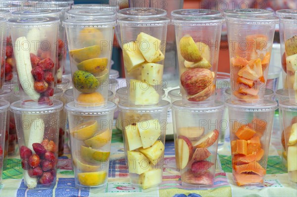 Fruit pieces in tall glasses