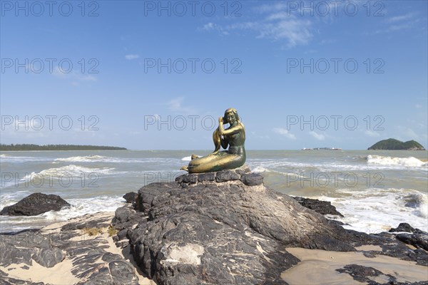 Golden mermaid sculpture on Samila beach